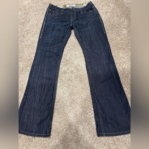 1921 slight bootcut jean, decorative stitching on rear pockets, size 28